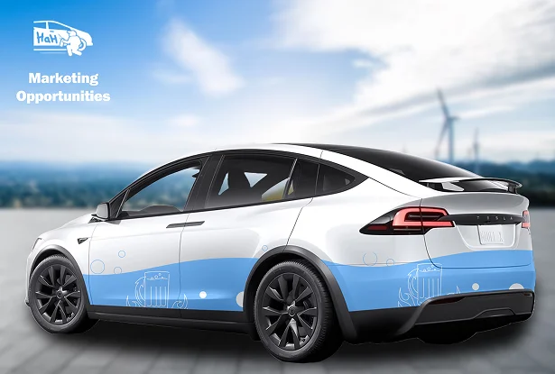 White SUV with a custom vinyl wrap featuring light blue branding elements, promoting business visibility while parked in an open area.