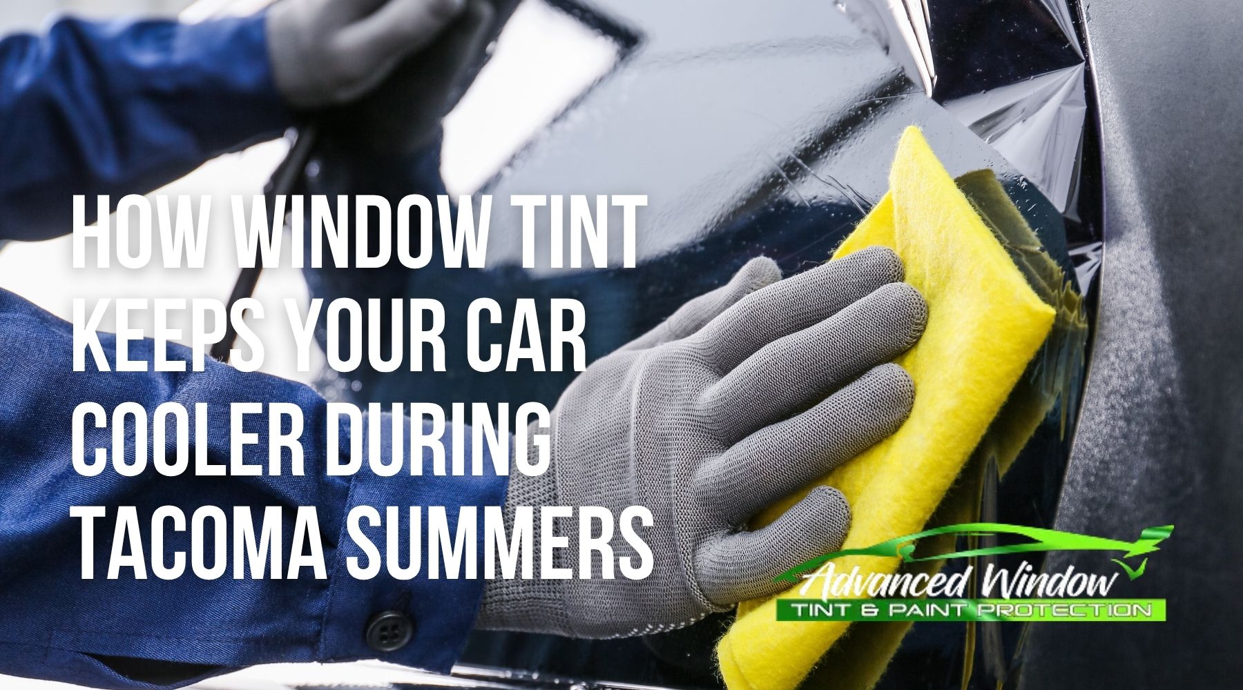 Technician applying window tint film to a car during a blog feature about keeping vehicles cooler in Tacoma summers