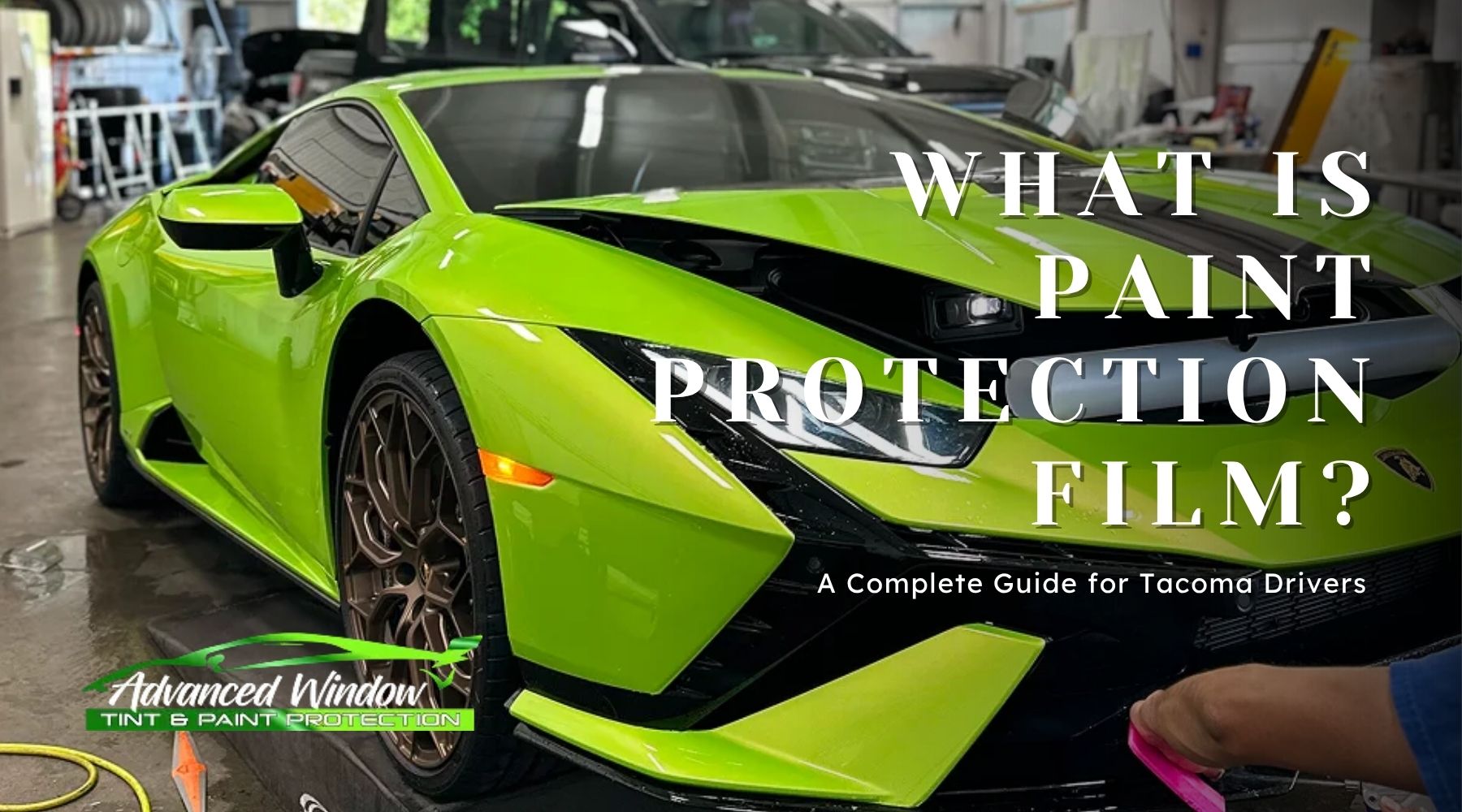 Green Lamborghini receiving paint protection film installation in Advanced Window Tinting & PPF shop